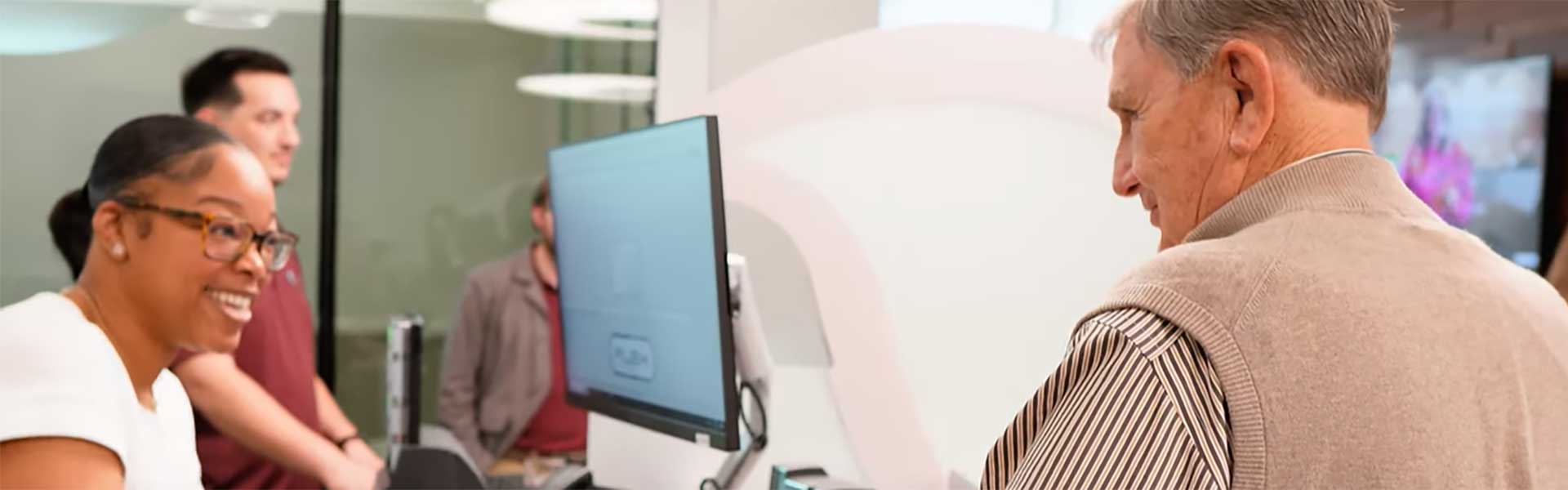 Woman looking at mobile phone and smiling